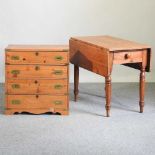 A pembroke table and chest