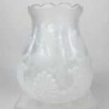 An etched glass oil lamp shade