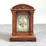Amended - An Edwardian walnut mantel clock