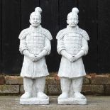 A pair of cast stone figures