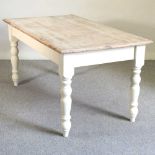 A pine and painted kitchen table