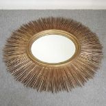 A large sunburst wall mirror