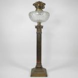 A brass Corinthian column oil lamp base