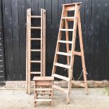 An extending wooden ladder