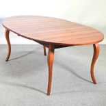 A cherrywood dining table