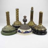 A collection of oil lamp bases