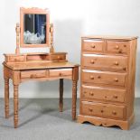 A dressing table and chest