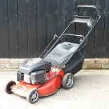 A Champion petrol lawnmower