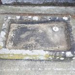 A cast stone sink
