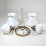 A pair of peg oil lamp fonts and shades