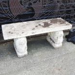 A cast stone bench