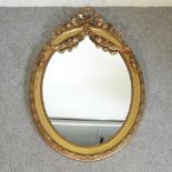 An Edwardian style gilt framed wall mirror