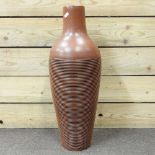 A studio pottery glazed terracotta vase