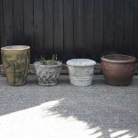 A collection of four garden pots