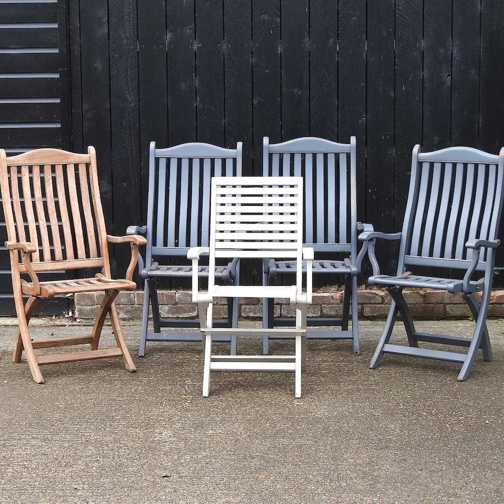 Five folding garden chairs
