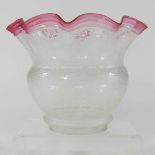 A clear and pink oil lamp shade