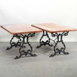 A pair of stained pine tables