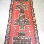 A Persian kelim rug