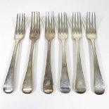 A set of six silver table forks