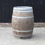 A large coopered oak barrel