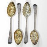 A set of four silver berry spoons