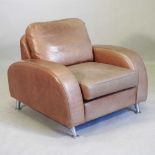 A modern tan leather armchair