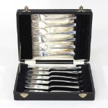 A set of silver fish cutlery