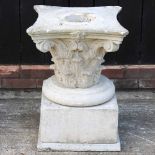 A Corinthian pedestal