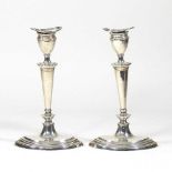 A pair of silver candlesticks