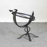 A black painted metal armillary sphere