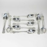 A set of nine Victorian silver table spoons