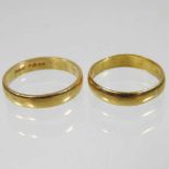 Two gold wedding bands