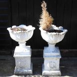 A pair of garden urns