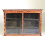 A Victorian walnut display cabinet