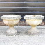 A pair of garden urns