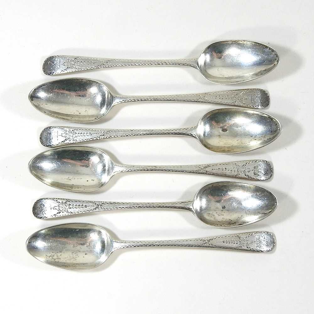 A set of six dessert spoons