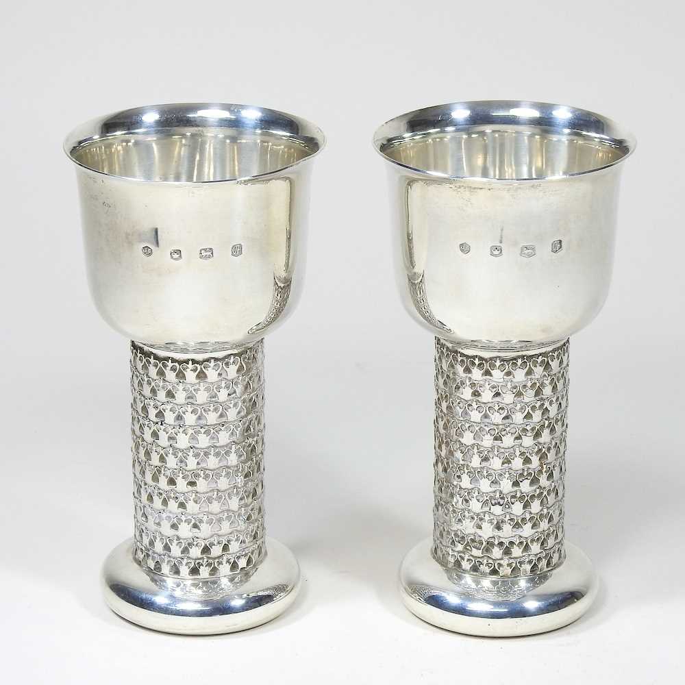 A pair of silver goblets