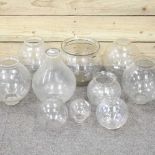 A collection of fishbowl vases