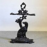 A black painted cast iron stick stand
