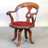 A 19th century revolving desk chair
