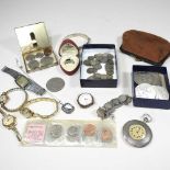 A collection of coins and jewellery