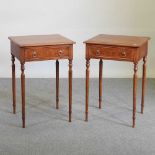 A pair of side tables