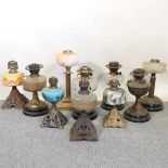 A collection of oil lamp bases