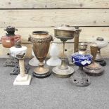 A collection of oil lamp bases