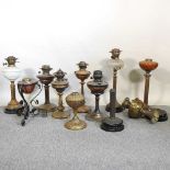 A collection of oil lamp bases