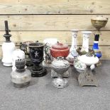 A collection of oil lamp bases