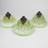 Three vaseline glass shades