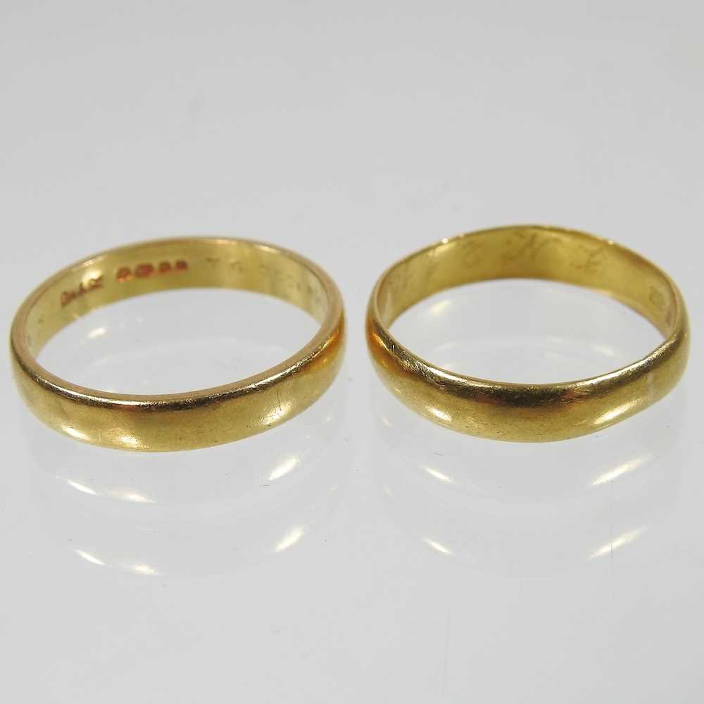 Two gold wedding bands