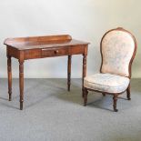 An Edwardian side table and chair