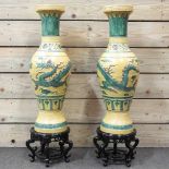 A pair of Chinese yellow glazed vases